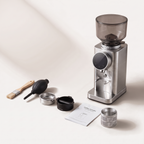 BioloMix CG210 grinder with its brush, blower, dosing cups and manual