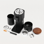CF Wisdom portable coffee grinder with its removable parts and accessories laid out