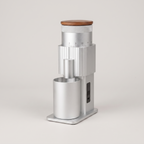 Silver CF Wisdom portable grinder with walnut lid, three-quarter view