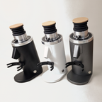 DF54 espresso grinder in black, white and dark grey side by side