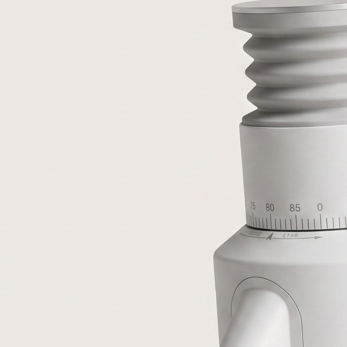 Close-up of the ribbed collar and graduated ring of the white GZZT GF64 grinder