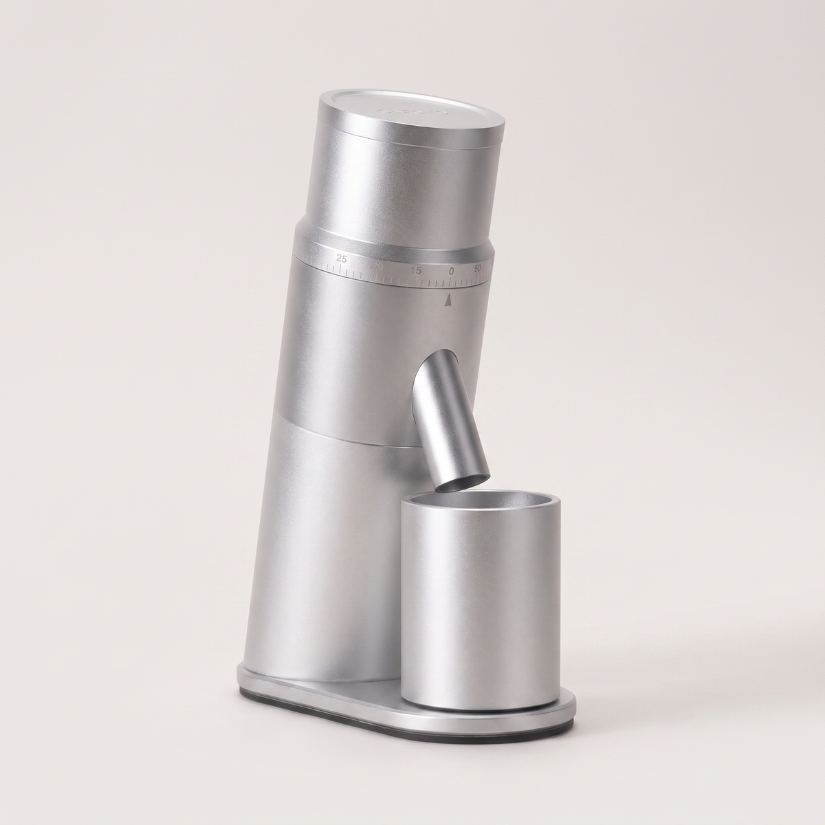 CAFOVO G1048C single dose coffee grinder in silver, with the magnetic grounds cup seated under the chute