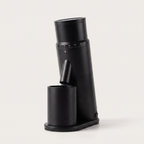 CAFOVO G1048C single dose coffee grinder in black, with the magnetic grounds cup seated under the chute