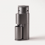 Graphite grey SIMELO Alien portable coffee grinder with its grounds cup