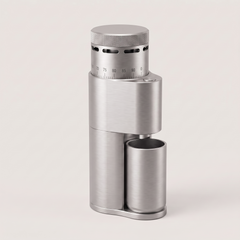 Silver SIMELO Alien portable coffee grinder with its grounds cup