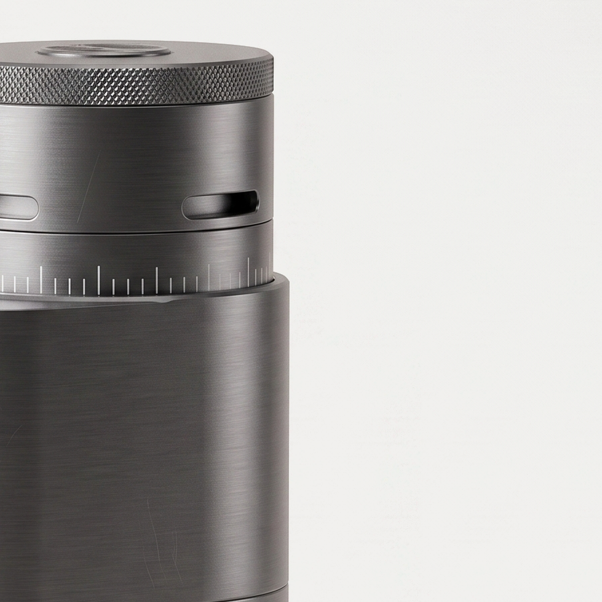 Close-up of the knurled cap and graduated ring of the graphite grey SIMELO Alien grinder