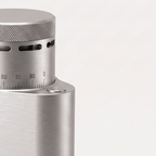 Close-up of the graduated collar of the silver SIMELO Alien grinder