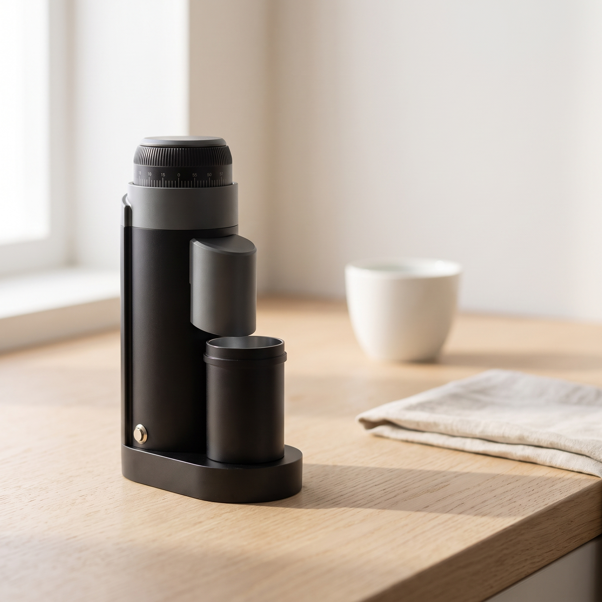 STARSEEKER Go50 coffee grinder on an oak kitchen counter in morning light